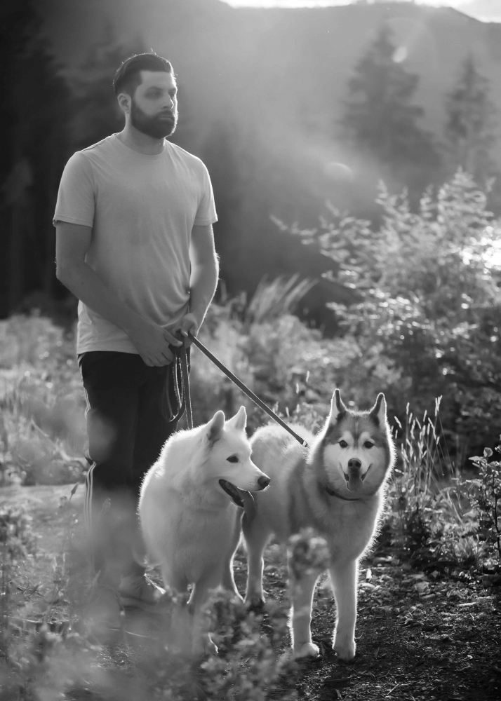Dustin with his two dogs, Ice and Montana